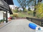 Terrasse auf Garagen Bild 1 - Reserviert – Grüne Idylle am Innenstadtrand mit traumhaftem Fernblick