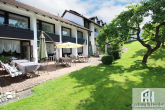 Garten unterer Teil mit Terrasse - Hotel an der A7