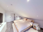 Schlafzimmer 2, DG, Bild 2 - Hochwertige 4-Zi. Maisonette-Whg (1.OG+DG) in Effizienzhaus in ruhiger & sonniger Lage in Baunatal