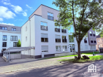 Straßenansicht mit TG-Einfahrt - 4-Zimmer-Whg mit Balkon in KfW 40-Effizienzhaus in Kassel-Unterneustadt
