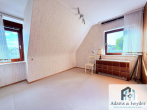 Schlafzimmer 3, Bild 1 - PREISREDUKTION! Ihr neues Zuhause am Fasanenhofpark – Einfamilienhaus mit viel Potential
