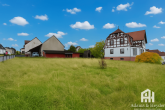 Außenbild mit Baugrundstück - Wohnen und Arbeiten unter einem Dach mit Extra-Bauplatz
