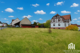 Außenbild mit Baugrundstück - Wohnen und Arbeiten unter einem Dach mit Extra-Bauplatz