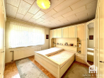 Schlafzimmer 1 (EG) - Gepflegtes Ein-/Zweifamilienhaus mit schönem Grundstück